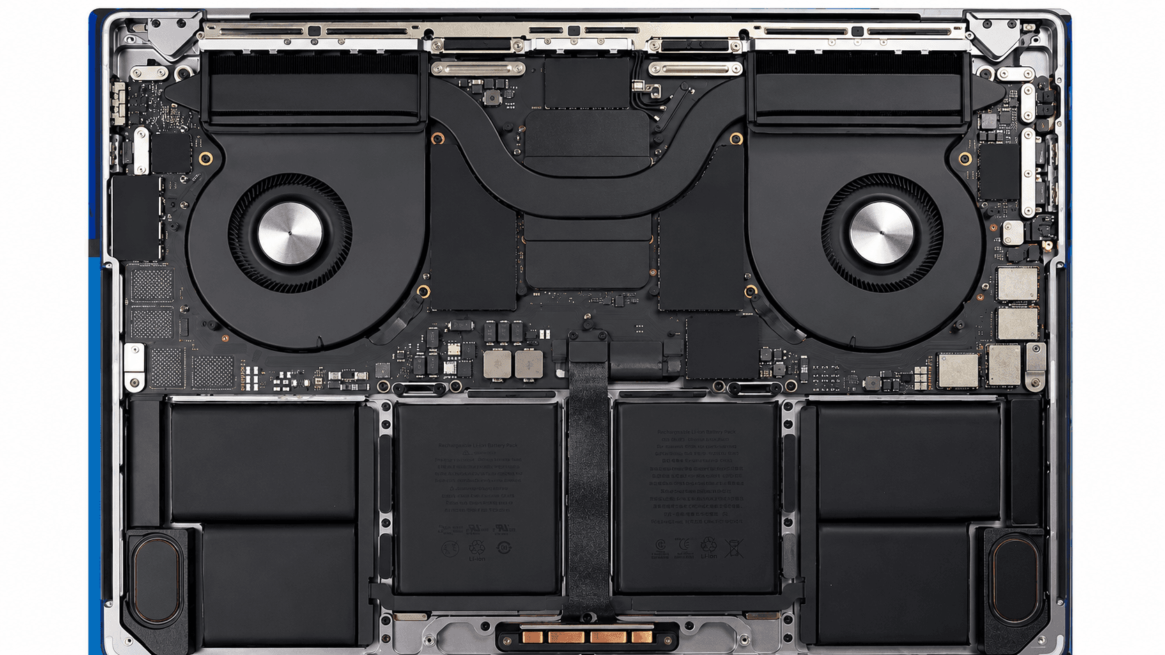 MacBook internals — logic board, dual fans and battery pack exposed for chip-level repair training